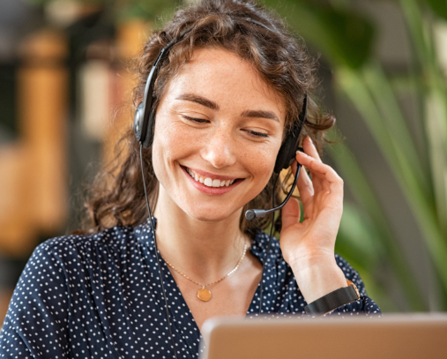Claritysoft support agent wearing a headset